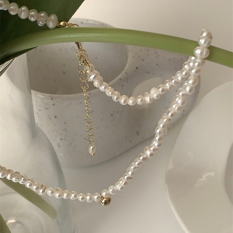 Pearl Necklace with a Gold Clasp