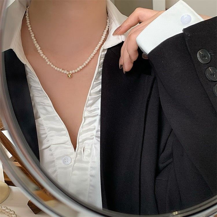 Pearl Necklace with a Gold Clasp
