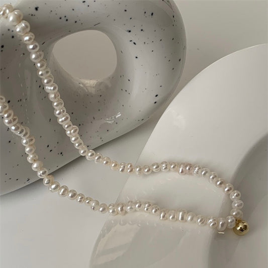 Pearl Necklace with a Gold Clasp