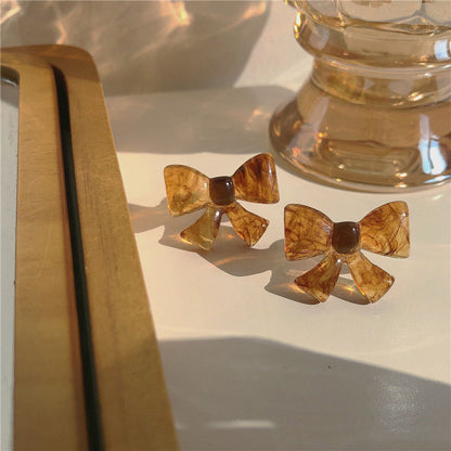 Amber Bow-tie Stud Earrings