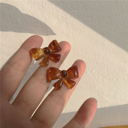 Amber Bow-tie Stud Earrings