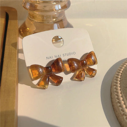 Amber Bow-tie Stud Earrings